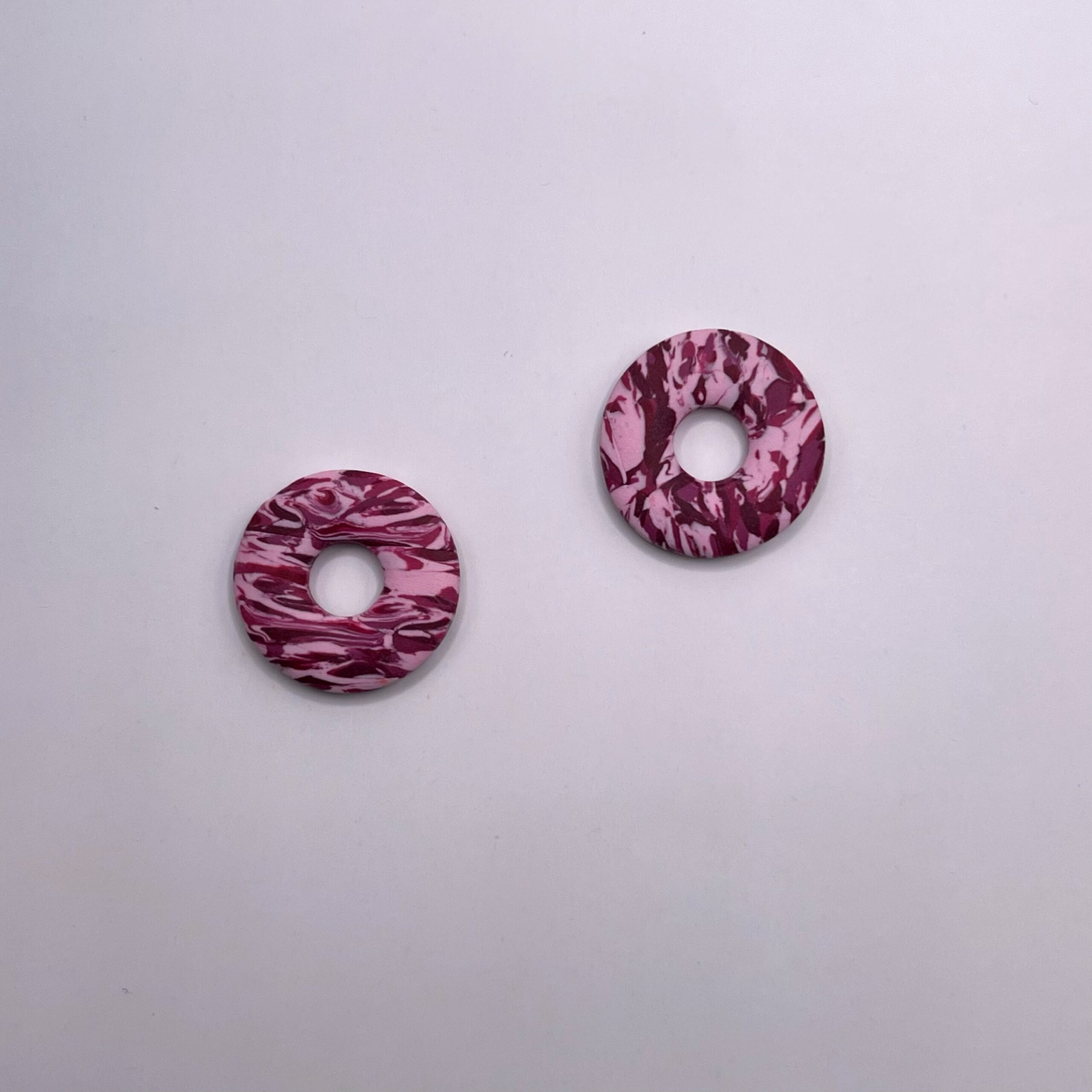 Charm Donut Marmolado Rosado
