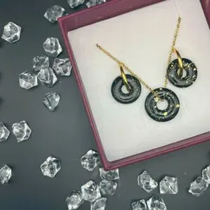 Set de pendientes y colgante NOX dorado
